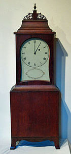 KIRTLAND H. CRUMP - fine cherry kidney dial shelf clock attributed to  - Desk Clock